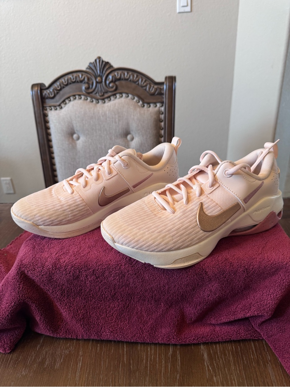 Nike Women’s Light Pink Athletic Sneakers with Gold Swoosh